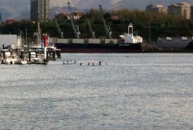 Paddling off into the distance